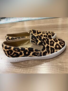 Michael Kors Leopard Print Slip-On Sneakers in Black and Tan